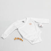 Wickelbody Langarm – Sanfte Linie